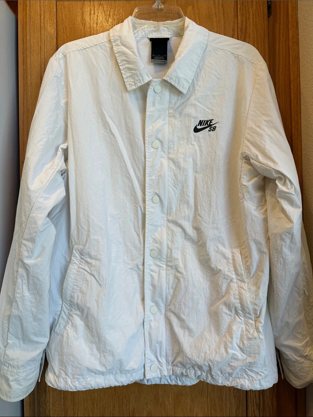 Nike SB White Coach Windbreaker Jacket with Drawstring Hem & Full Lining Size M